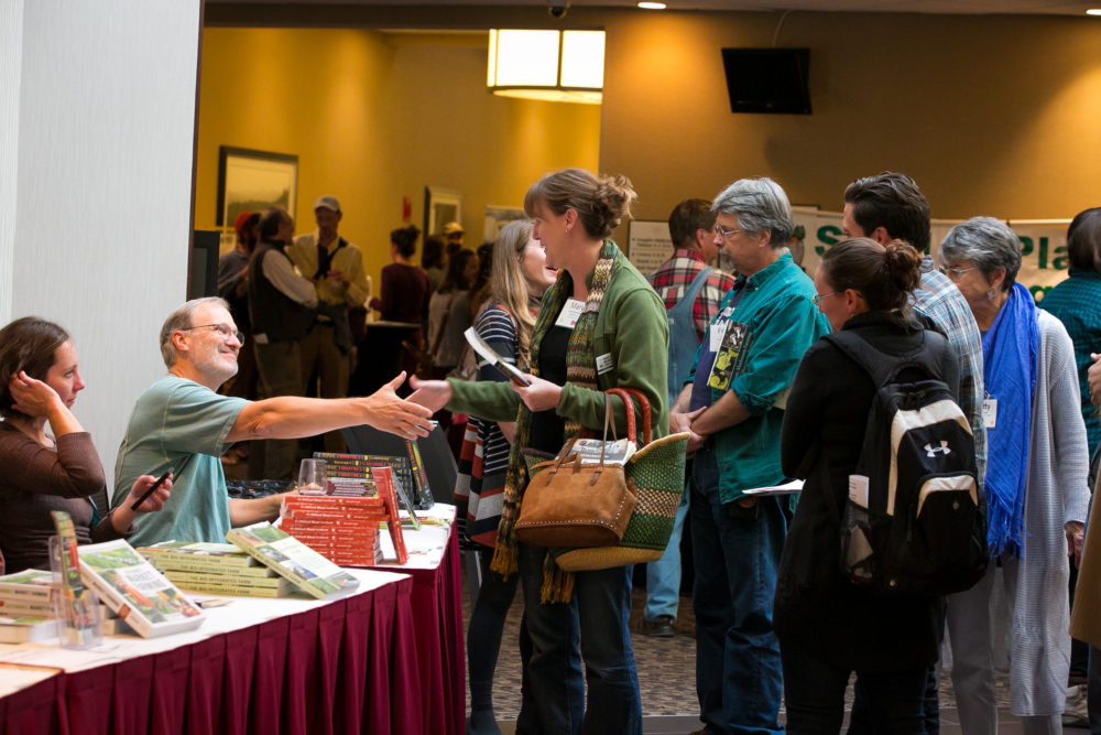 SAC attendees meeting authors at the book signing