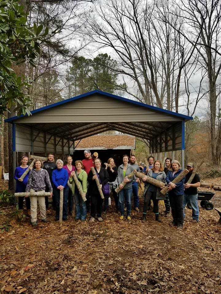 Participants at a hands-on mushroom inoculation workshop by Haw River Mushrooms