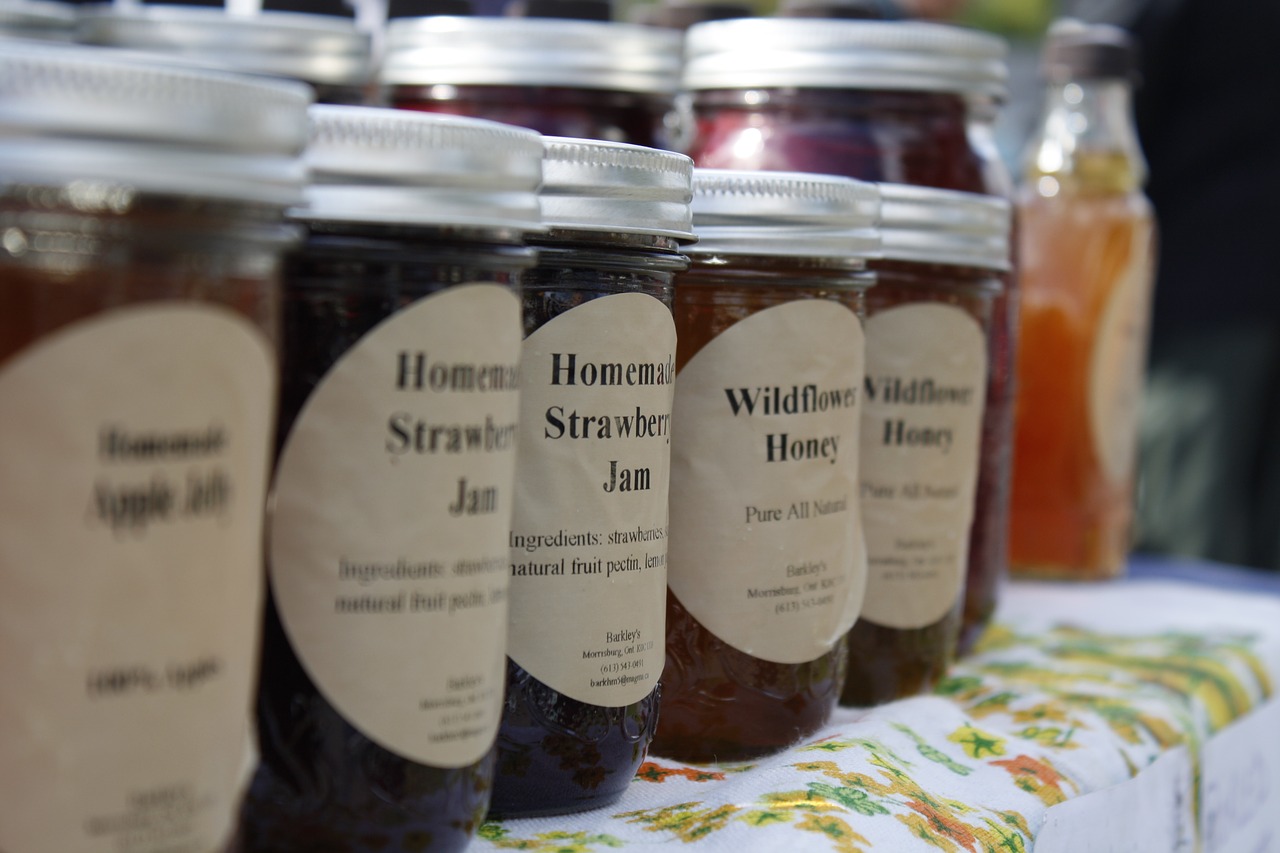 Five jars of jam for sale at the farmers market